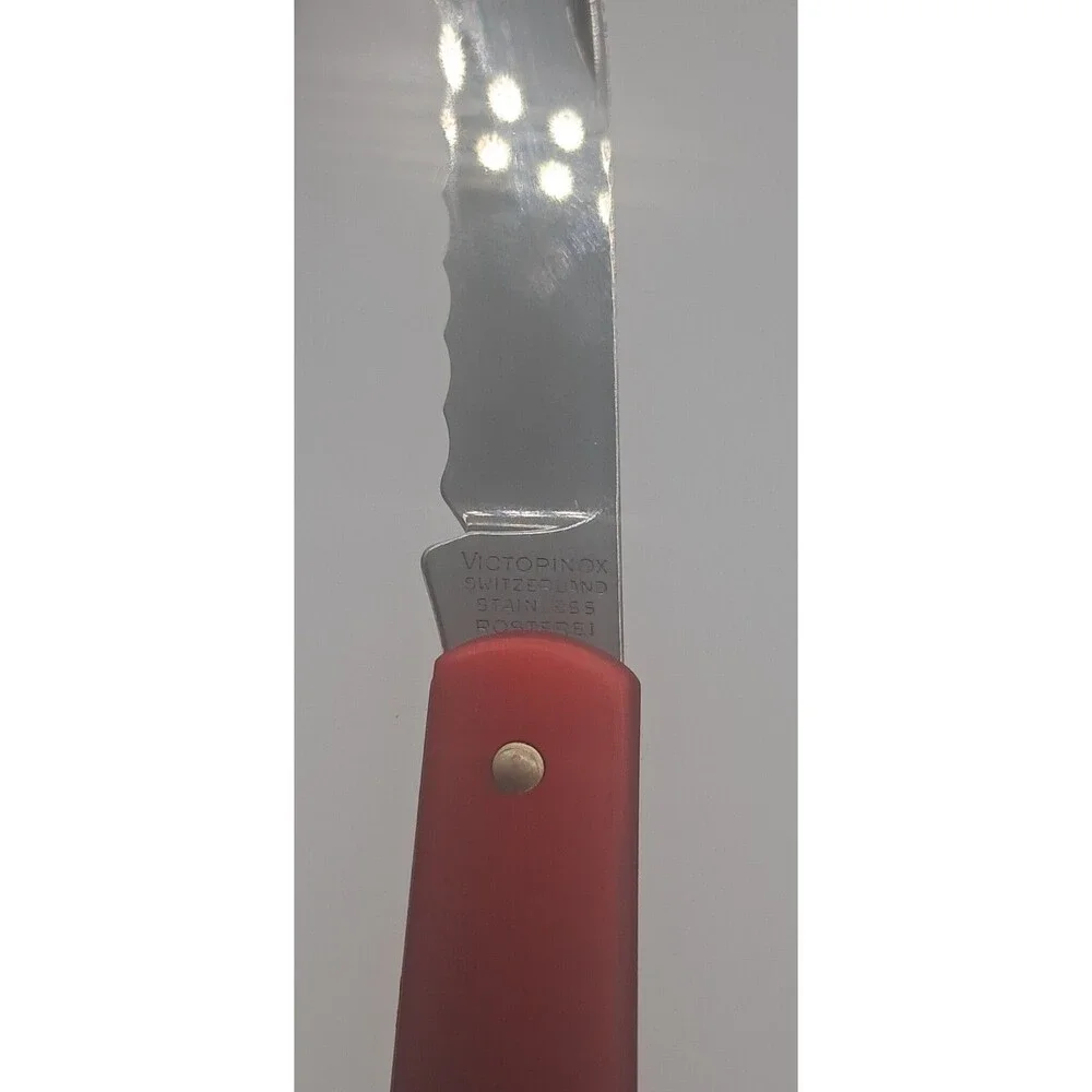 Victorinox Baker's Knife - Folding Curved Serrated Stainless Blade - Switzerland